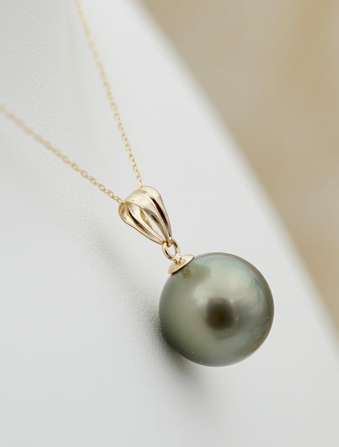 Collection Rima perle ronde de 11mm sur Or