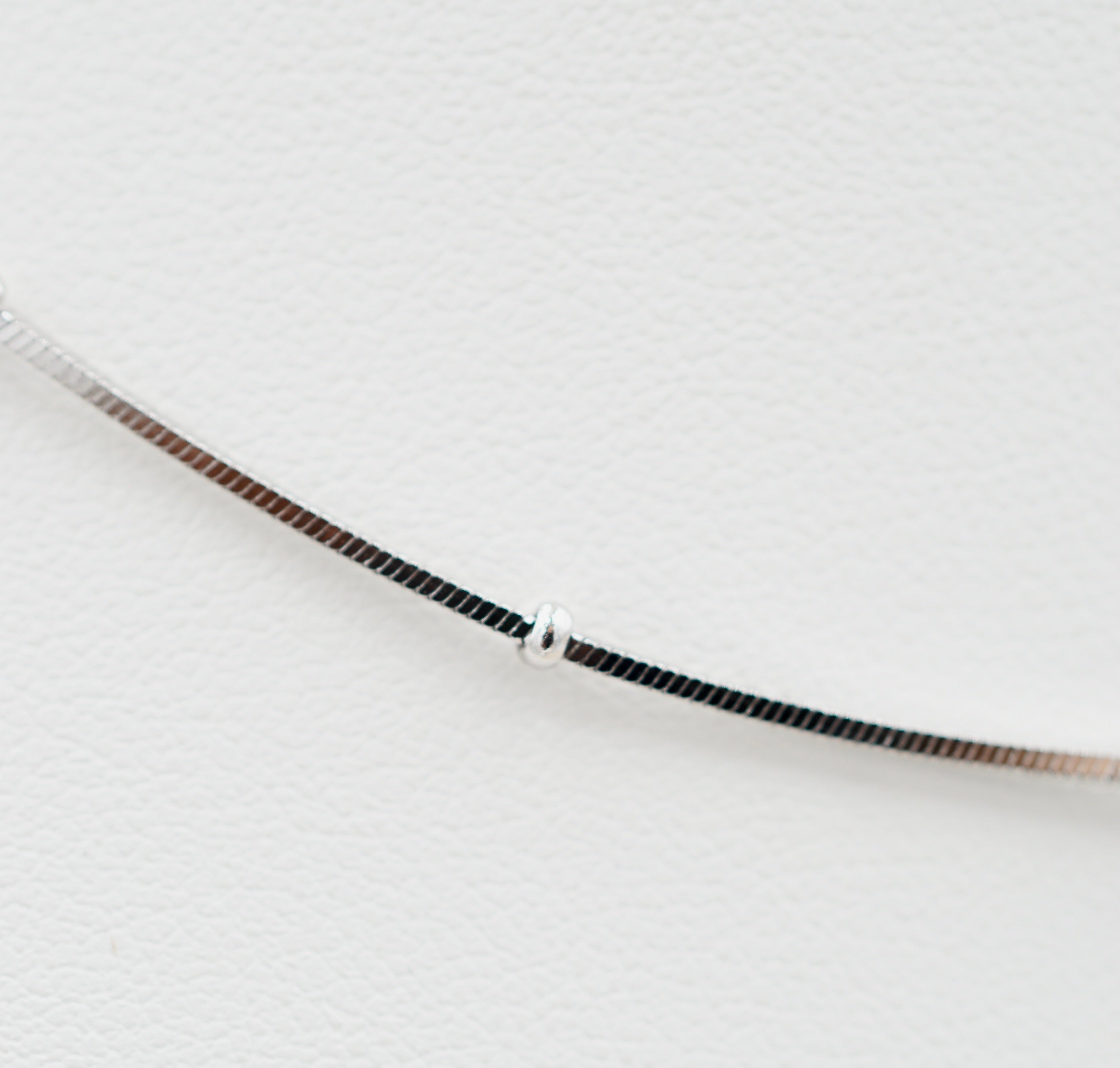 Chaîne perlé maille serpentine carré 0.8mm - Argent 925 rhodié de 40cm