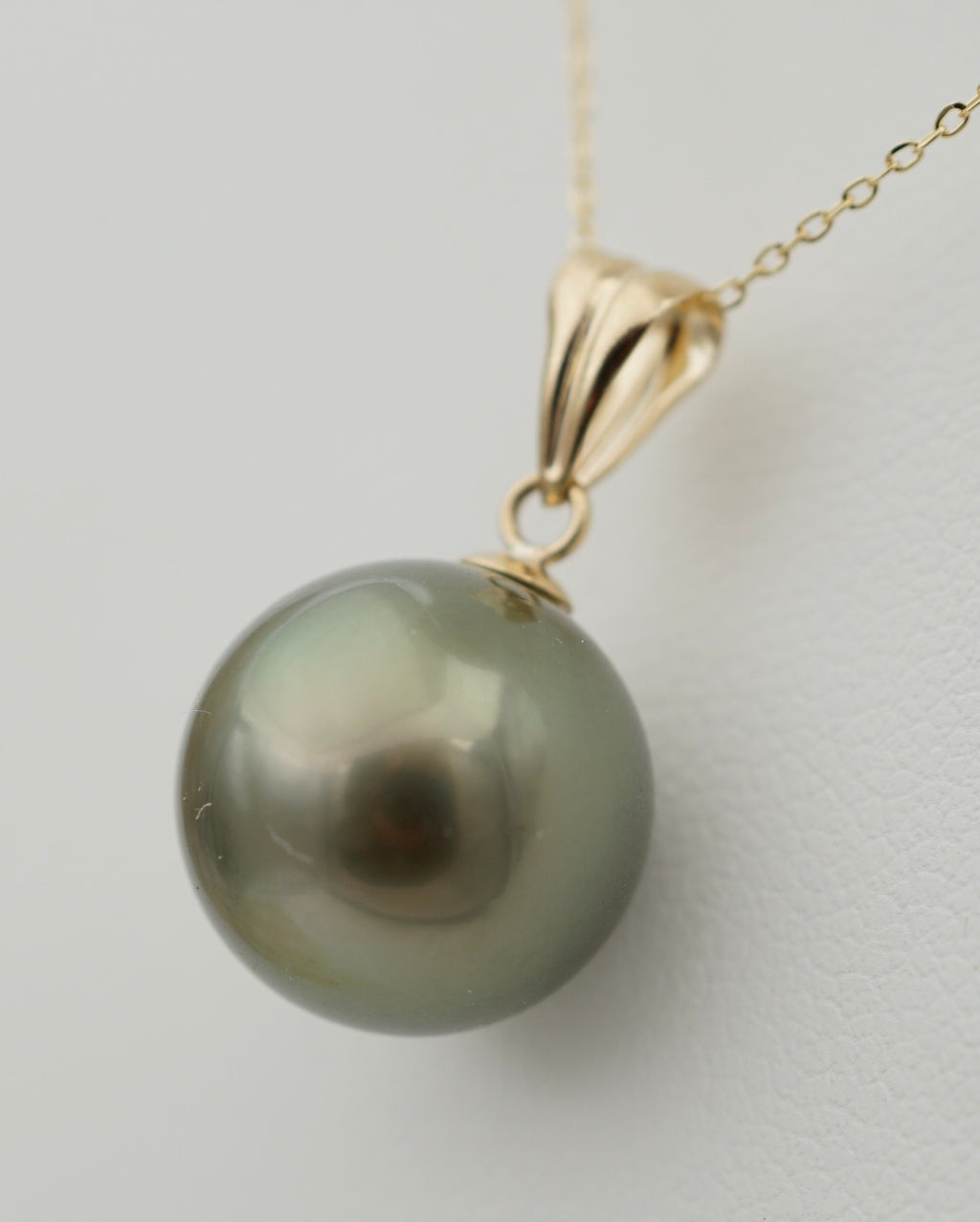 Collection Rima perle ronde de 11mm sur Or