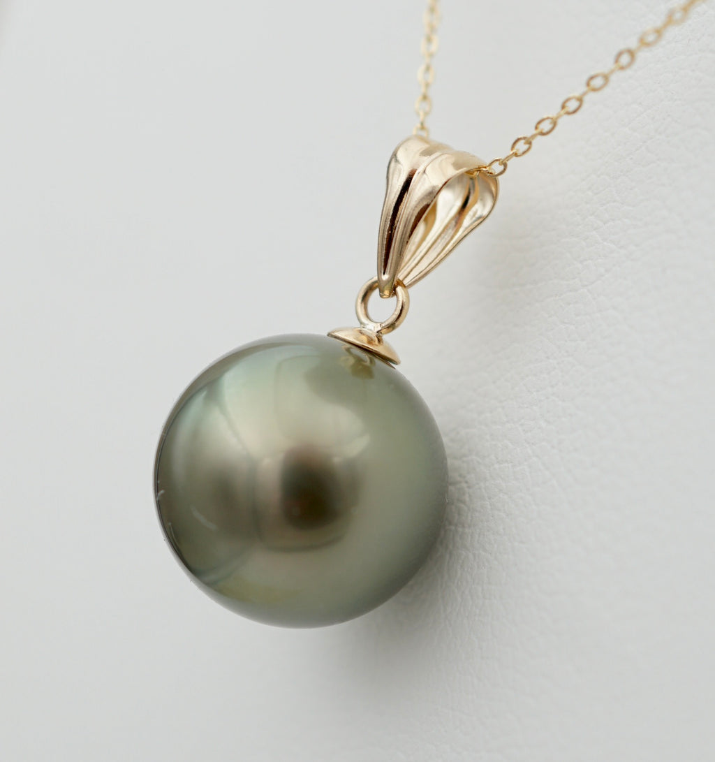 Collection Rima perle ronde de 11mm sur Or