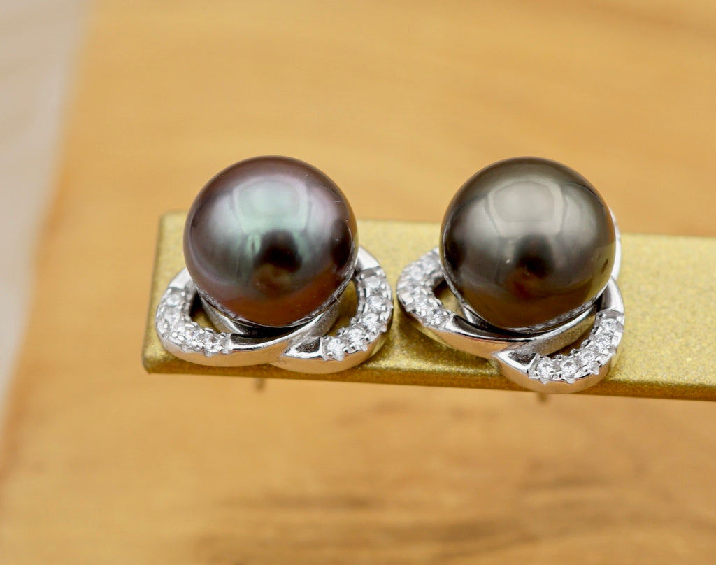 Parata deux splendides perles de Tahiti montées en boucles d'oreilles