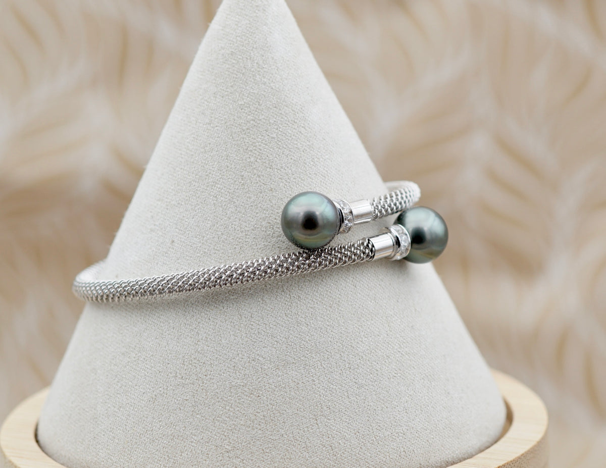 Splendide bracelet en argent rodhié orné de deux véritables perles de Tahiti AAA